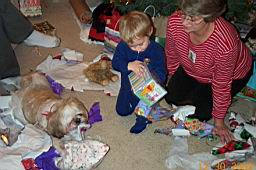 DCP_2322-Mom-Tyler-Buddy OPENING his pillow.JPG